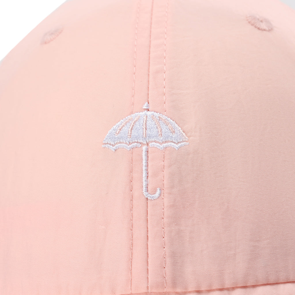 Helas Classic Bucket Hat in Peach - photograph 3 - closeup of branding embroidery