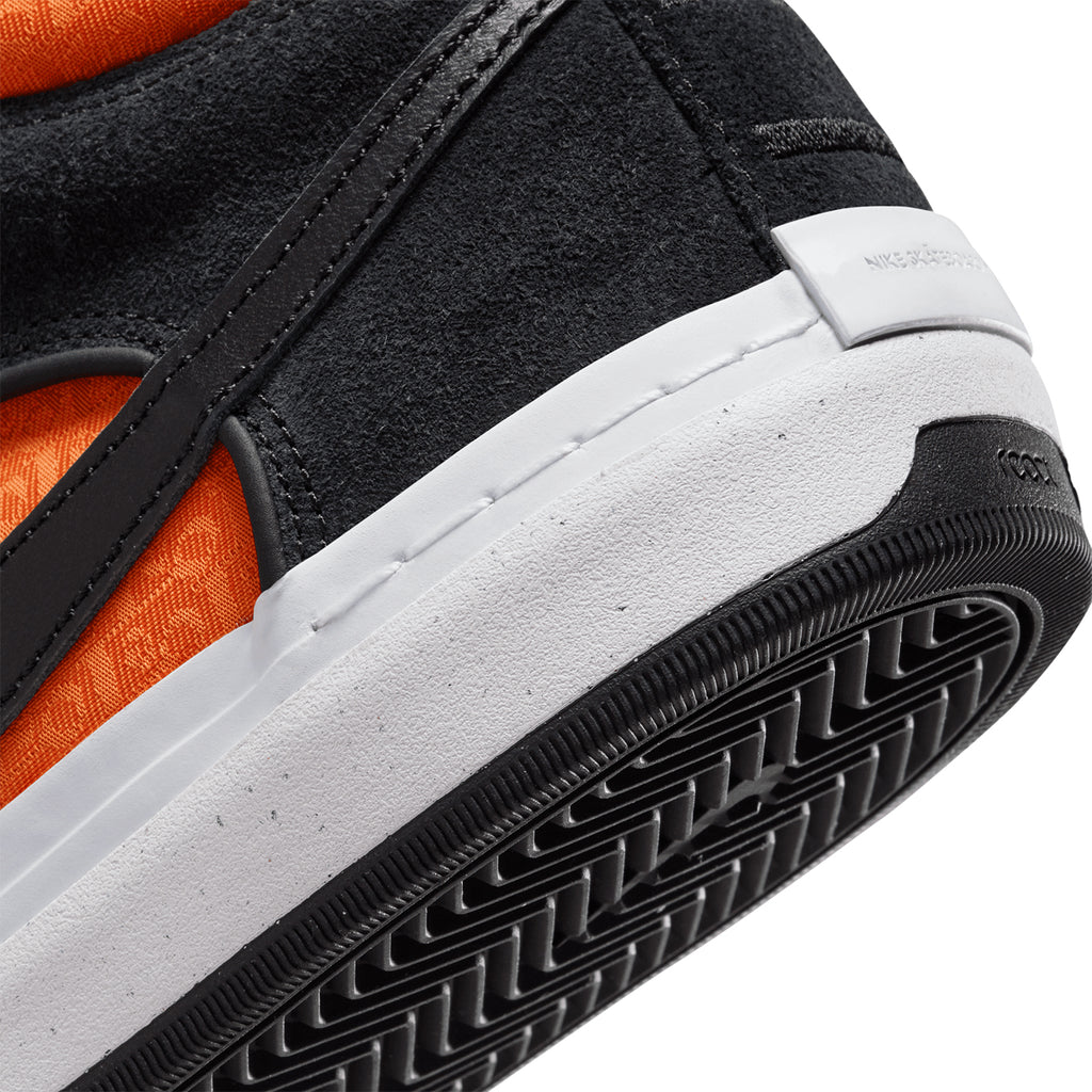 Nike SB x React Leo Shoes - Black / Black -  Orange - Electric Orange - heel