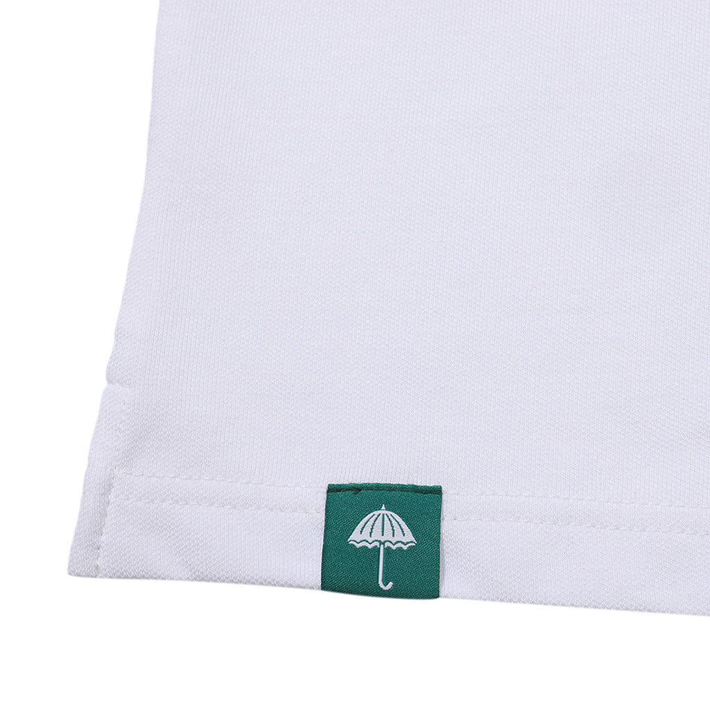 Helas Agass Polo Shirt in White Photo 6 - closeup of branding on the hem of the garment