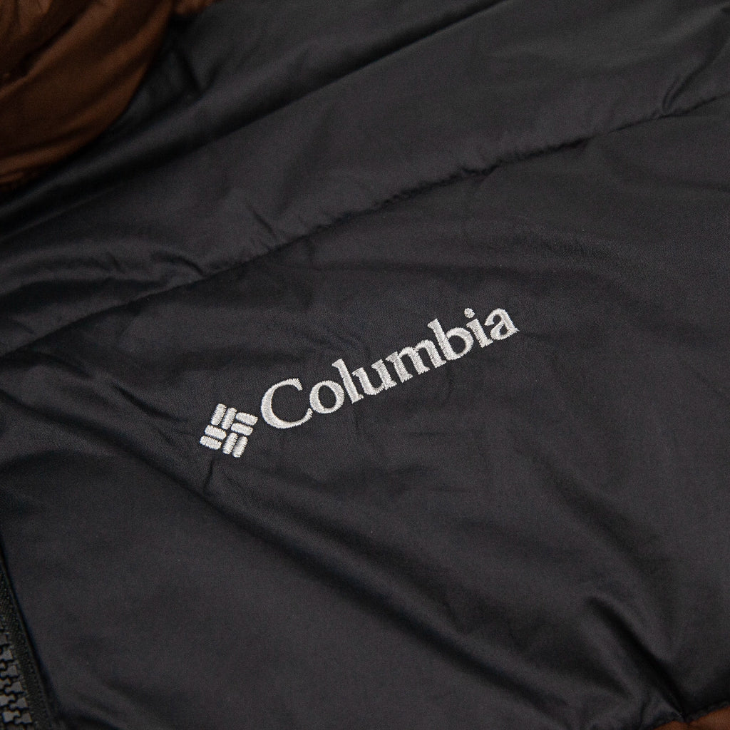 Columbia logo on a black Pike Lake jacket
