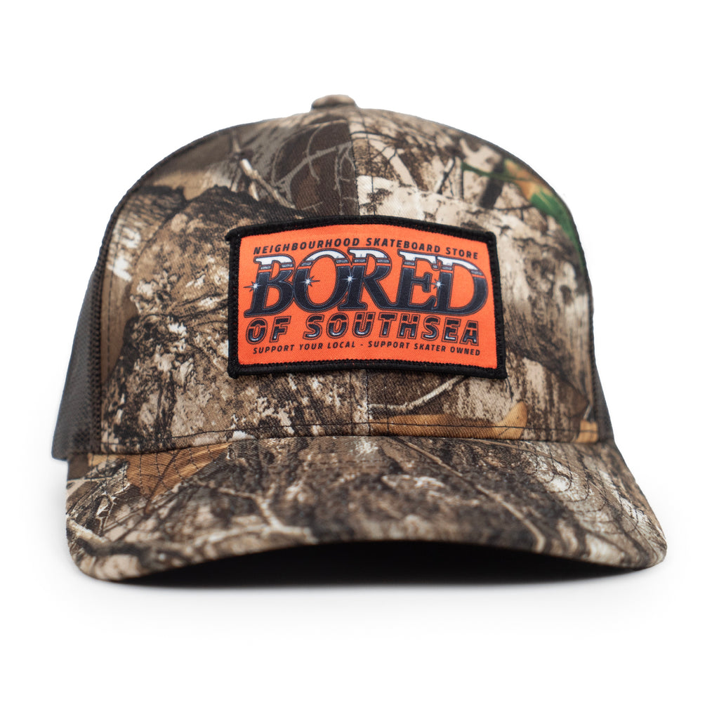 Bored of Southsea Neighbourhood  Trucker Cap - RealTree Camo - front