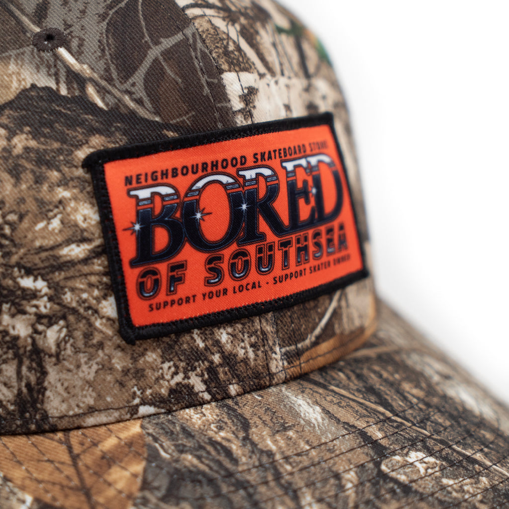Bored of Southsea Neighbourhood  Trucker Cap - RealTree Camo - closeup