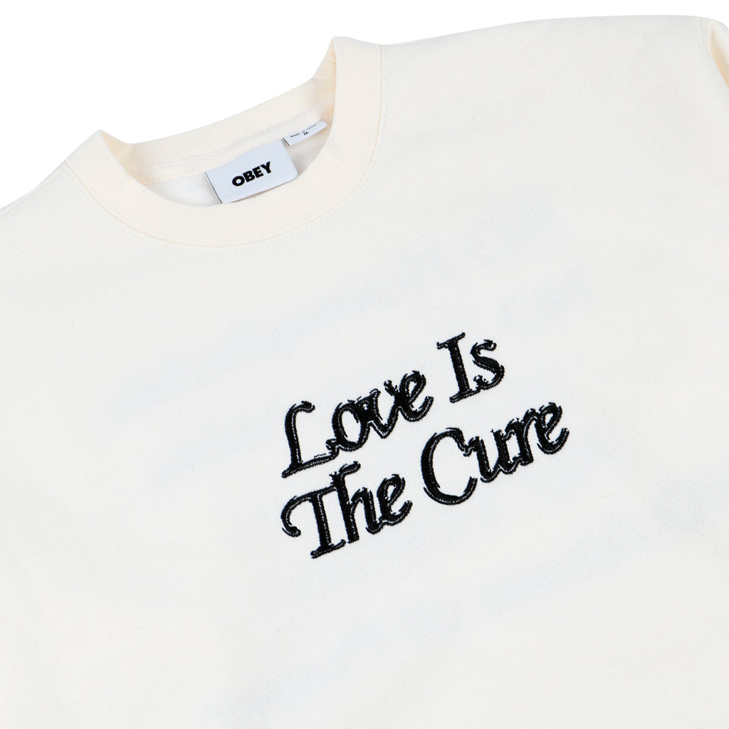 Obey Clothing Love Is The Cure Crew Sweatshirt in Unbleached - Detail